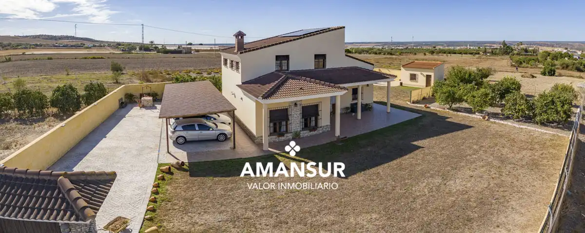 Vista exterior de Casa o xalet en venda en Villarrasa amb Aire condicionat, Calefacció i Jardí privat