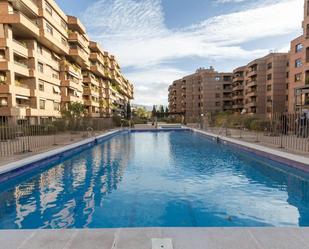 Swimming pool of Attic for sale in  Granada Capital  with Heating, Terrace and Community pool