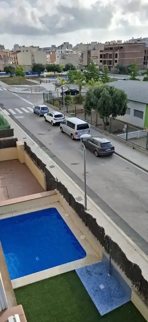 Aparcament de Pis en venda en La Ràpita amb Aire condicionat, Terrassa i Piscina