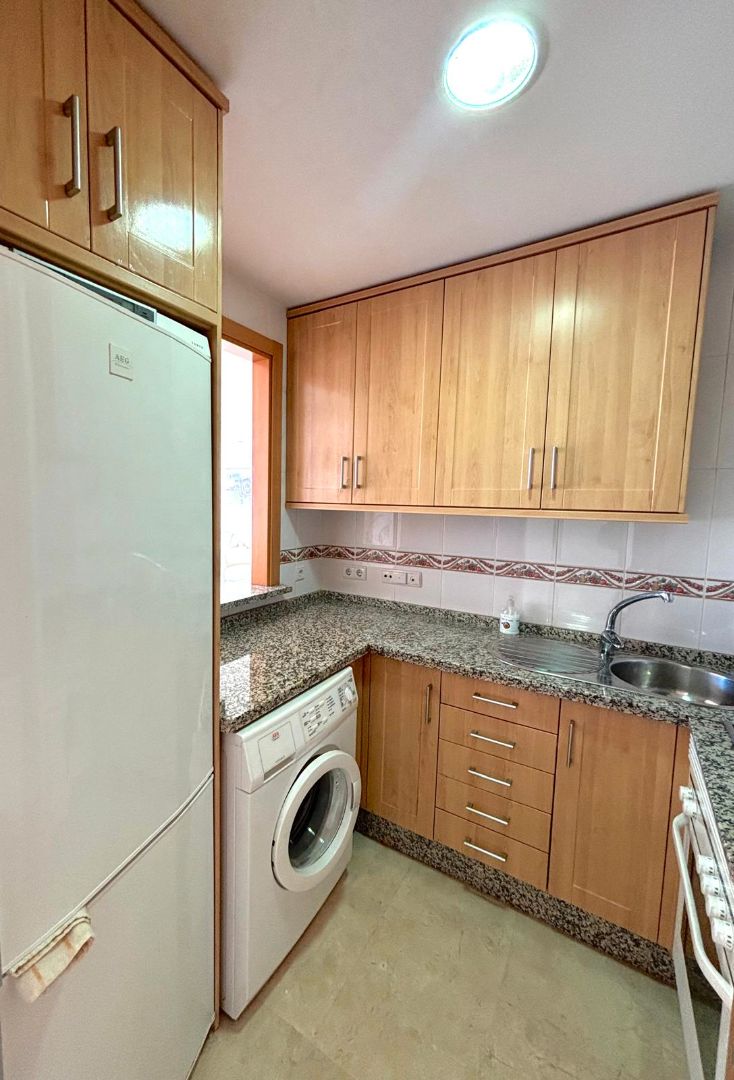 Kitchen of Flat for sale in Benalmádena  with Air Conditioner, Terrace and Storage room