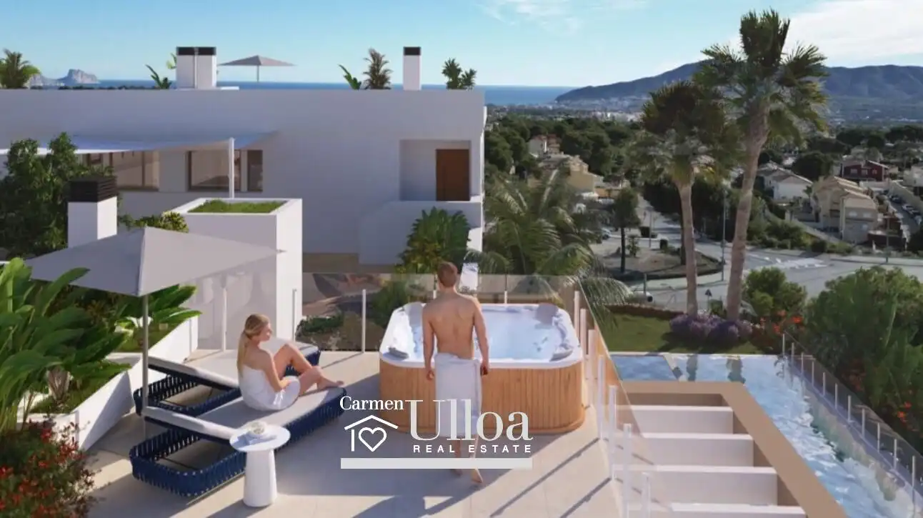 Vista exterior de Casa adosada en venda en L'Alfàs del Pi amb Calefacció, Jardí privat i Piscina comunitària