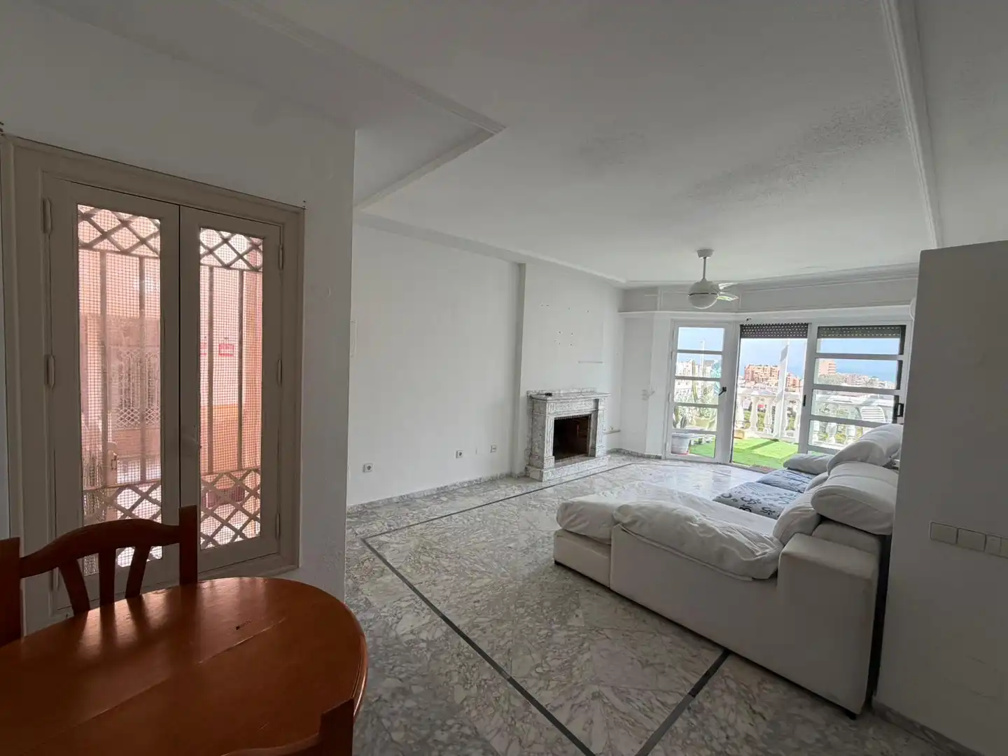 Sala de estar de Piso en venta en La Manga del Mar Menor con Terraza y Piscina comunitaria