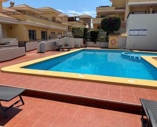 Piscina de Casa adosada en venda en L'Alfàs del Pi amb Aire condicionat, Calefacció i Terrassa