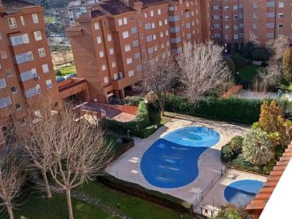 Swimming pool of Attic for sale in  Madrid Capital  with Air Conditioner, Heating and Parquet flooring