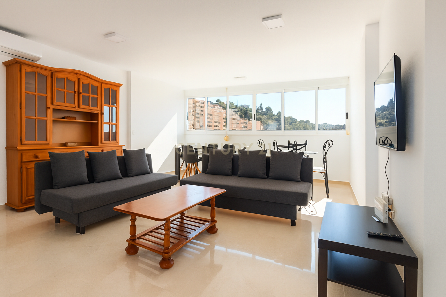 Living room of Flat for sale in Benidorm  with Air Conditioner, Private garden and Oven