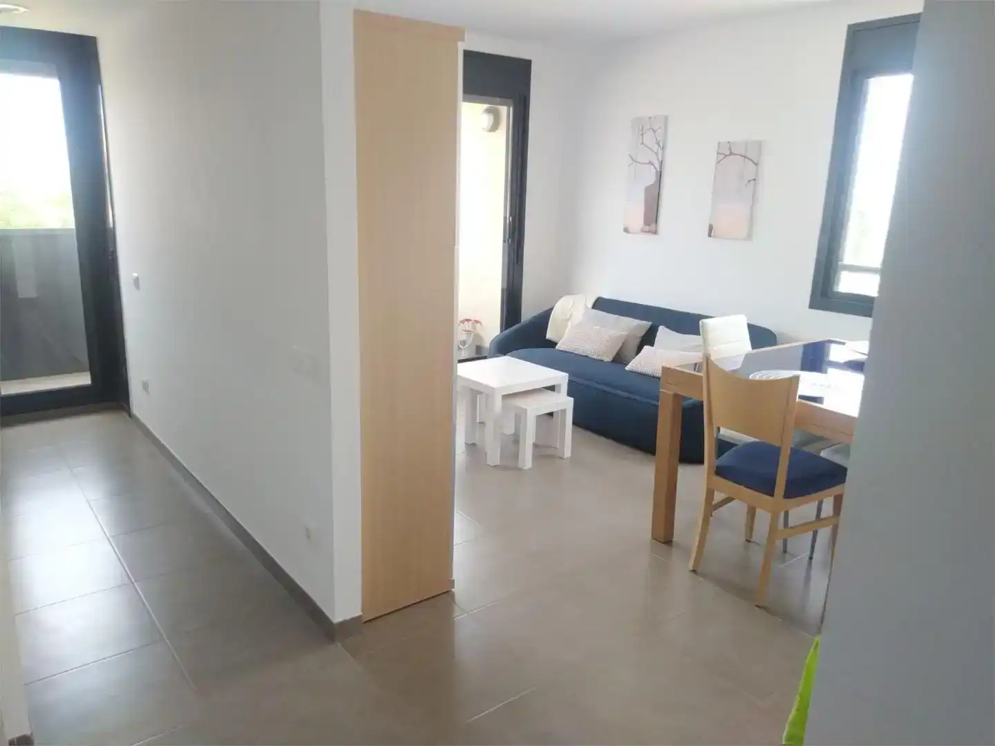 Sala d'estar de Apartament de lloguer en Alcanar amb Aire condicionat, Jardí privat i Piscina