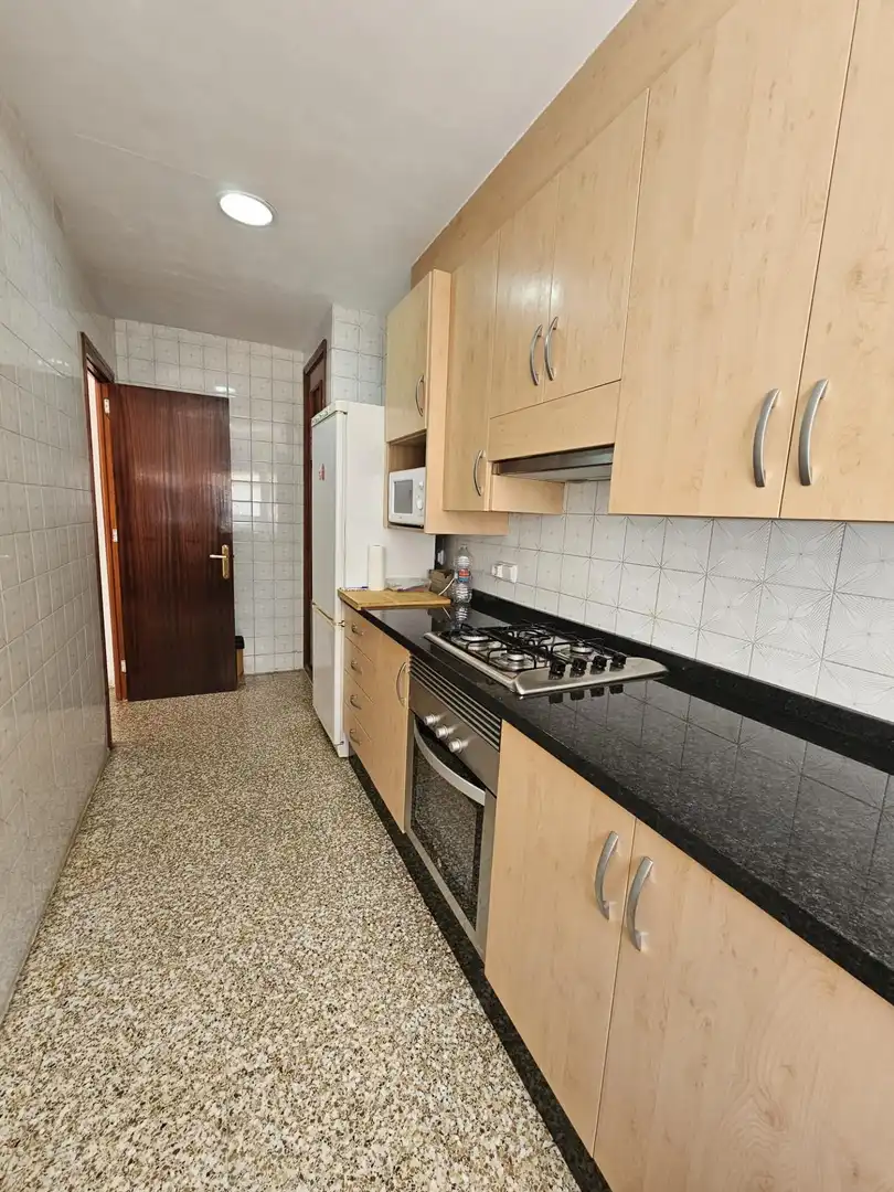 Cuina de Casa adosada en venda en Sueca amb Aire condicionat, Terrassa i Moblat