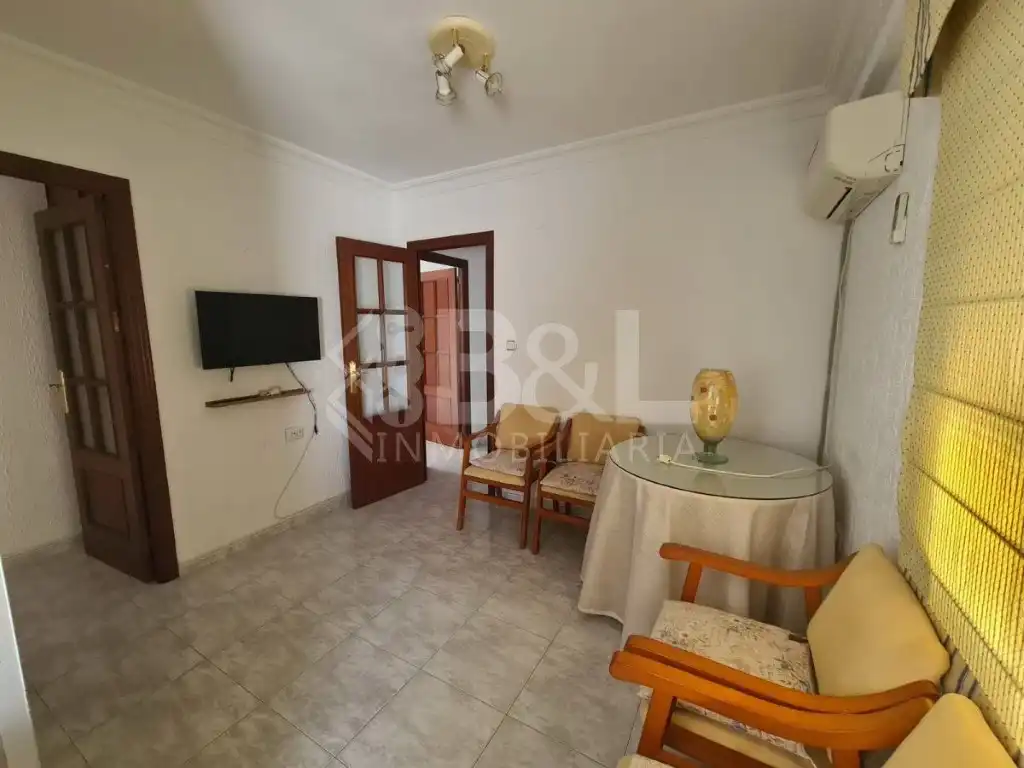 Sala d'estar de Pis de lloguer en Huelva amb Aire condicionat i Moblat
