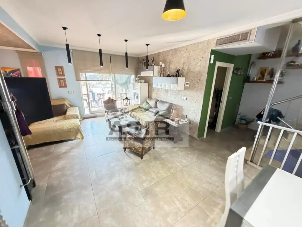 Sala d'estar de Casa o xalet en venda en Alzira amb Terrassa i Piscina