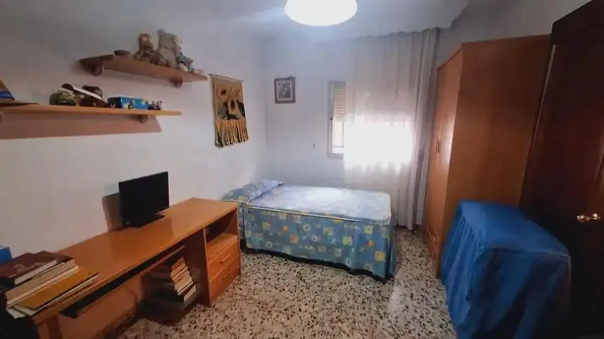 Habitación de Casa adosada en venta en Málaga con Aire acondicionado y Terraza