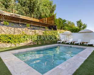 Swimming pool of Single-family semi-detached for sale in Villamartín  with Air Conditioner, Heating and Private garden