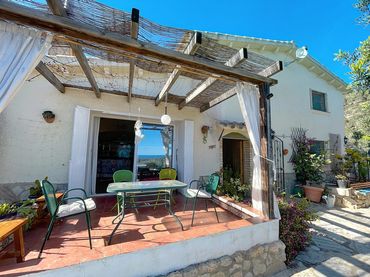 Casa rústica con piscina en venta en Partida Figuerasa