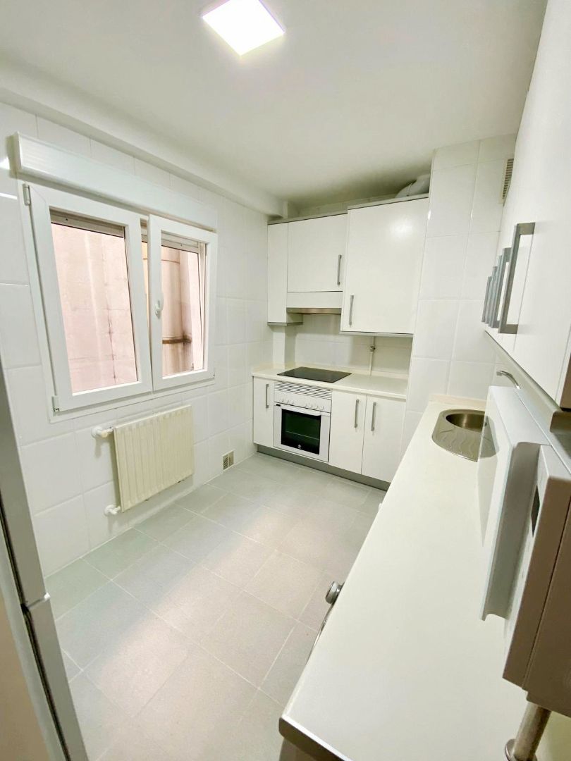 Kitchen of Flat to rent in Gijón   with Heating, Parquet flooring and Storage room