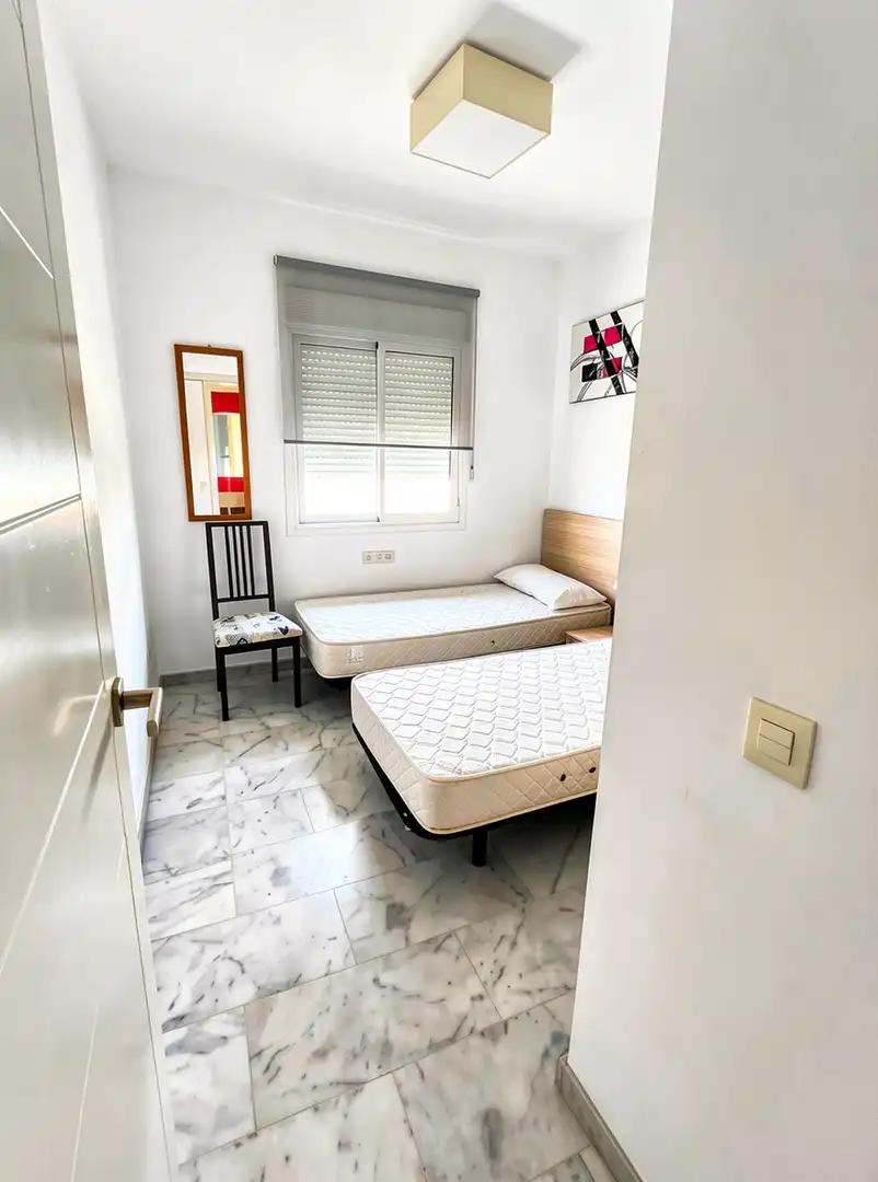 Dormitori de Apartament en venda en Estepona amb Aire condicionat, Terrassa i Piscina