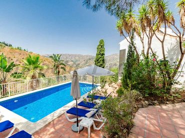 Casa rústica con piscina en venta en Cómpeta