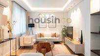 Living room of Flat for sale in  Madrid Capital  with Air Conditioner, Heating and Parquet flooring