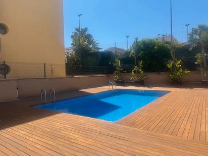 Swimming pool of Planta baja for sale in Torredembarra  with Air Conditioner, Heating and Private garden
