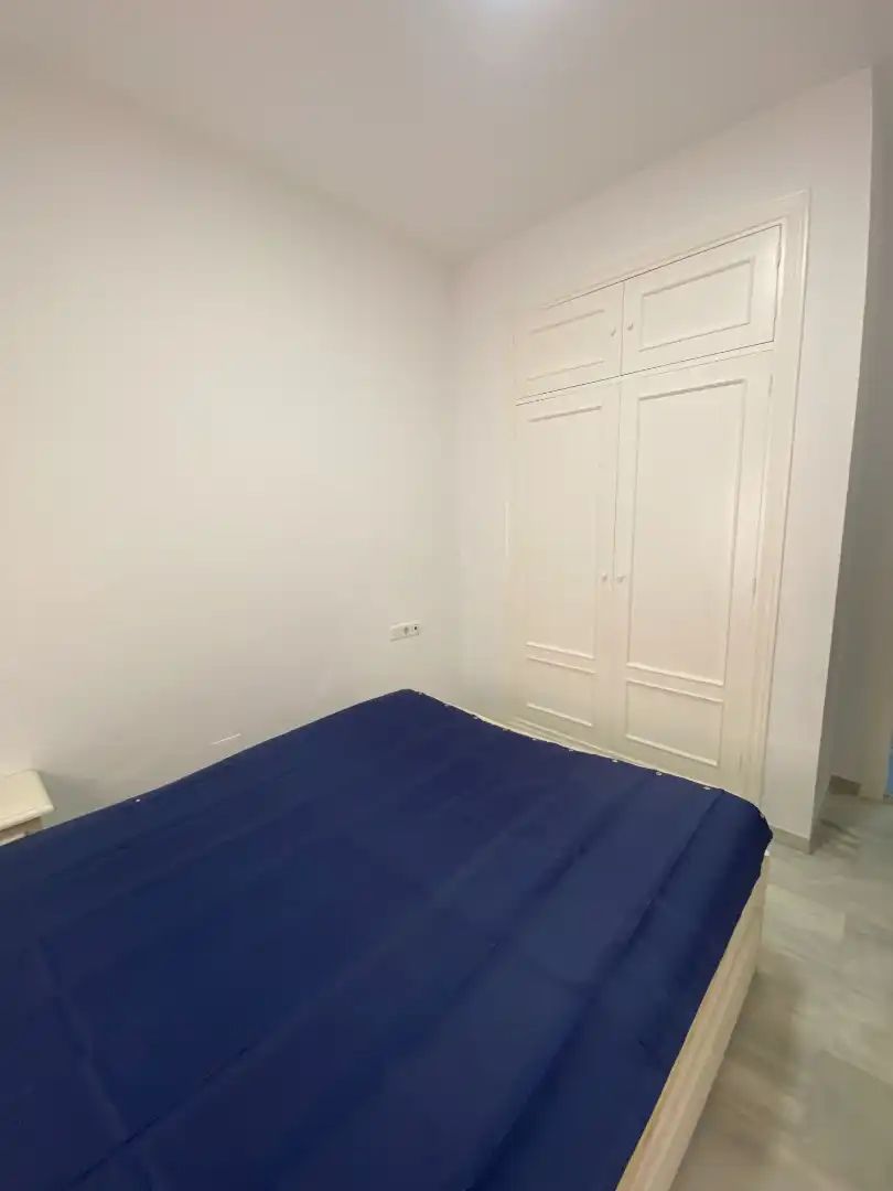 Dormitori de Apartament de lloguer en Málaga amb Aire condicionat, Moblat i Rentadora