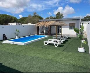 Piscina de Casa o xalet de lloguer en Chiclana de la Frontera amb Aire condicionat, Jardí privat i Piscina