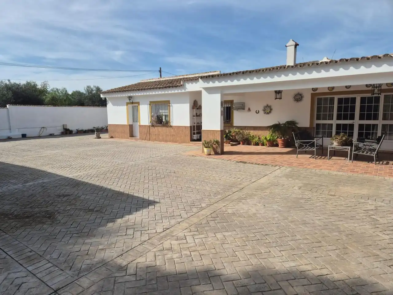 Vista exterior de Casa o chalet en venta en Palomares del Río con Aire acondicionado, Jardín privado y Terraza