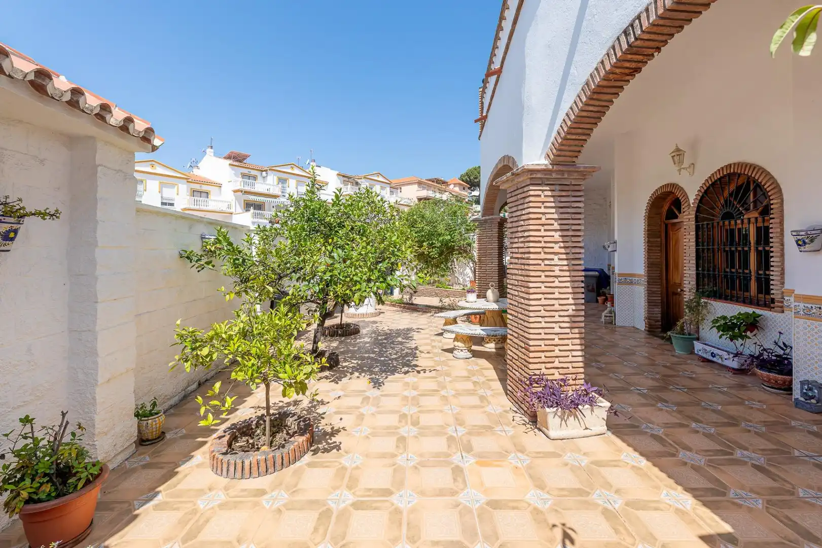 Jardí de Casa adosada en venda en Benalmádena amb Aire condicionat i Terrassa