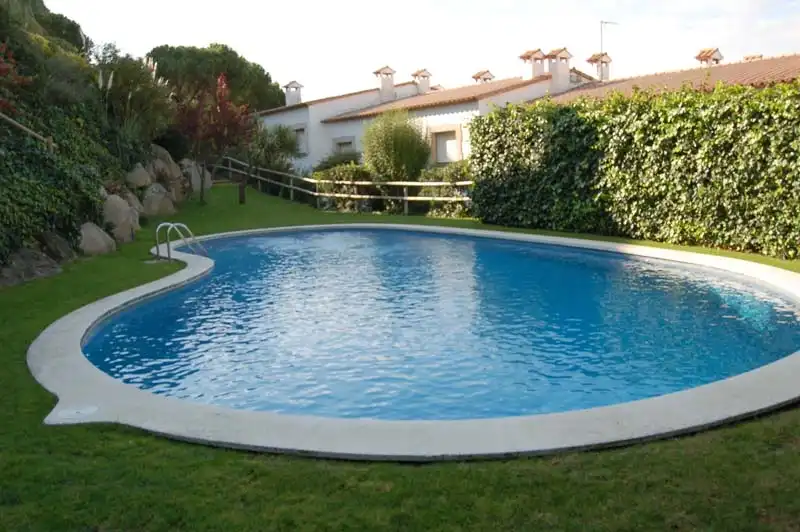 Piscina de Casa adosada en venta en Sant Feliu de Guíxols con Calefacción, Terraza y Amueblado