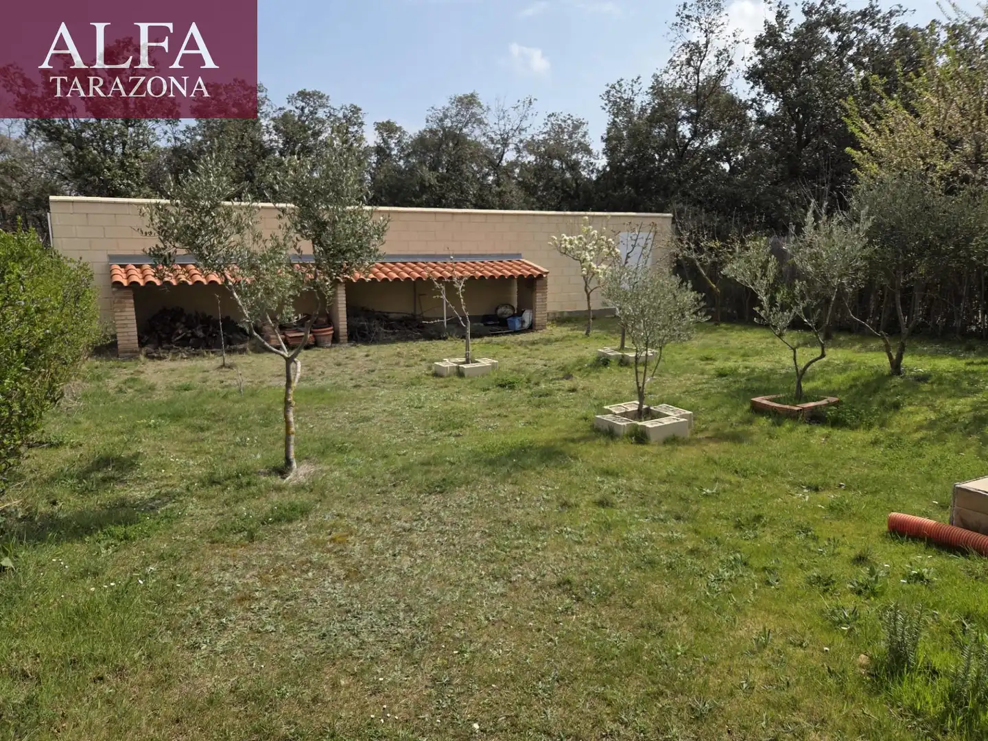 Garten von Einfamilien-Reihenhaus zum Verkauf in Añón de Moncayo mit Privatgarten, Terrasse und Gemeinschaftspool