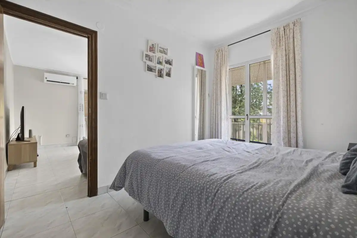 Schlafzimmer von Wohnung zum Verkauf in San Juan de Aznalfarache mit Klimaanlage, Heizung und Terrasse