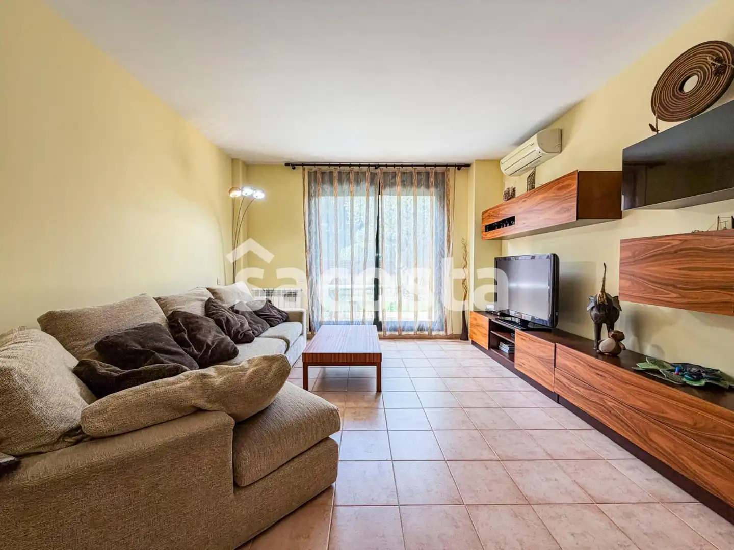 Sala de estar de Casa adosada en venta en Lloret de Mar con Aire acondicionado, Calefacción y Jardín privado