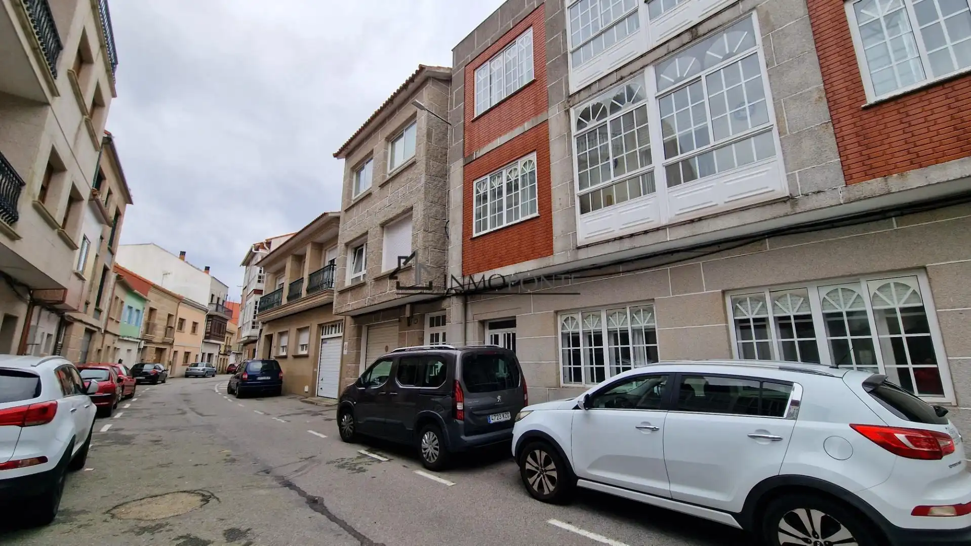 Vista exterior de Casa adosada en venda en O Grove   amb Calefacció, Jardí privat i Traster