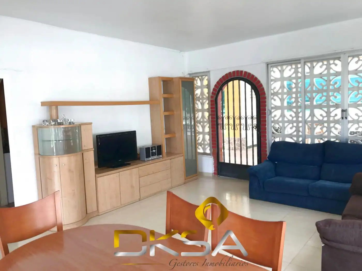 Sala d'estar de Casa adosada en venda en Benicasim / Benicàssim amb Calefacció, Jardí privat i Terrassa