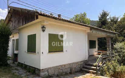 Vista exterior de Casa o xalet en venda en Cercedilla amb Calefacció, Jardí privat i Piscina