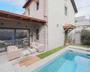 Swimming pool of House or chalet for sale in  Madrid Capital  with Air Conditioner and Swimming Pool