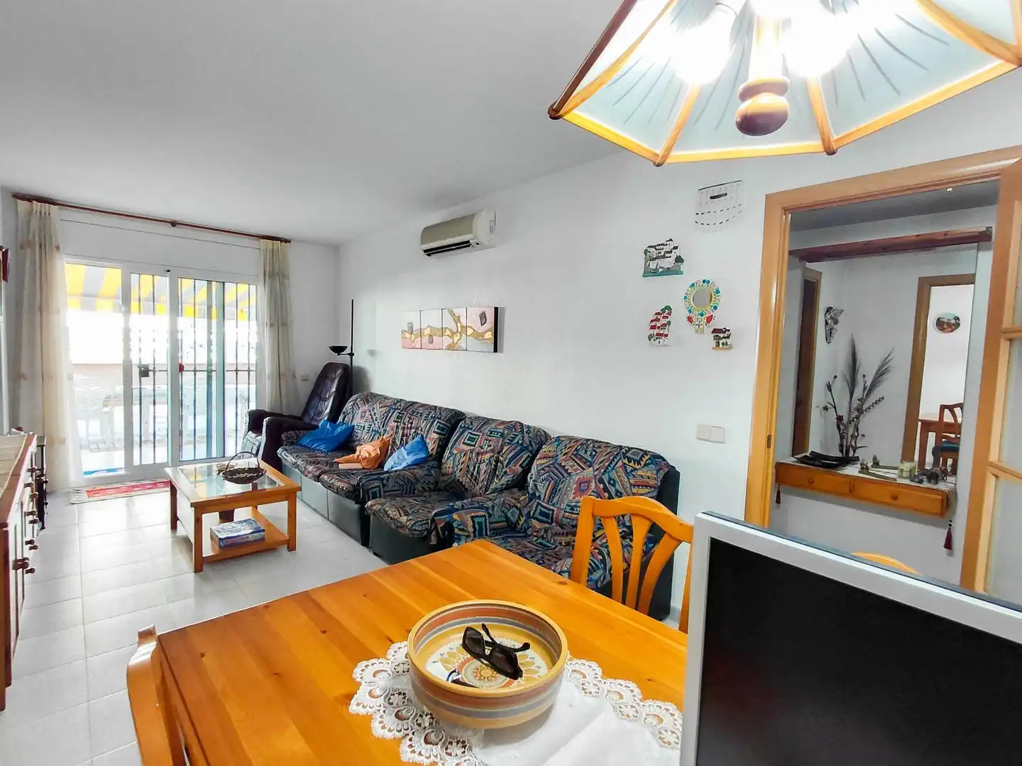 Living room of Ground floor for sale in Cunit  with Air Conditioner, Private garden and Terrace