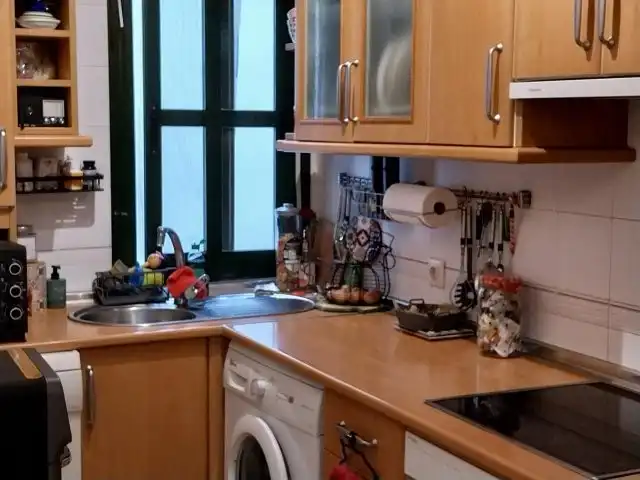 Küche von Wohnung zum Verkauf in Manilva mit Privatgarten, Terrasse und Gemeinschaftspool
