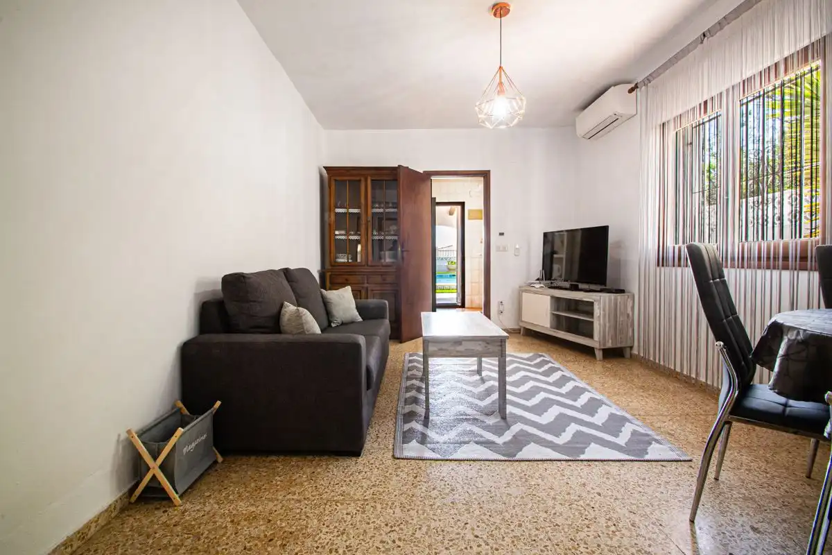 Living room of Houses for sale in Calpe / Calp  with Air Conditioner, Heating and Private garden