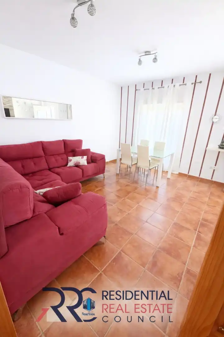 Sala de estar de Casa adosada en venta en Cartaya con Alarma