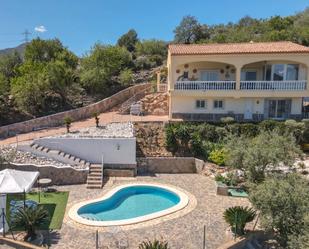 Vista exterior de Casa o xalet en venda en Monda amb Aire condicionat i Piscina