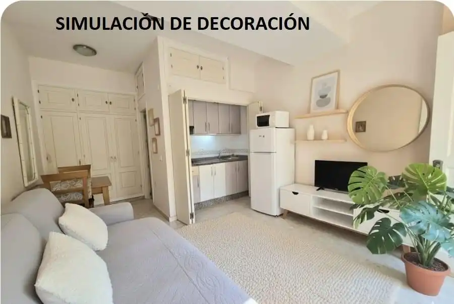 Sala de estar de Estudio en venta en Benalmádena con Jardín privado, Amueblado y Piscina comunitaria