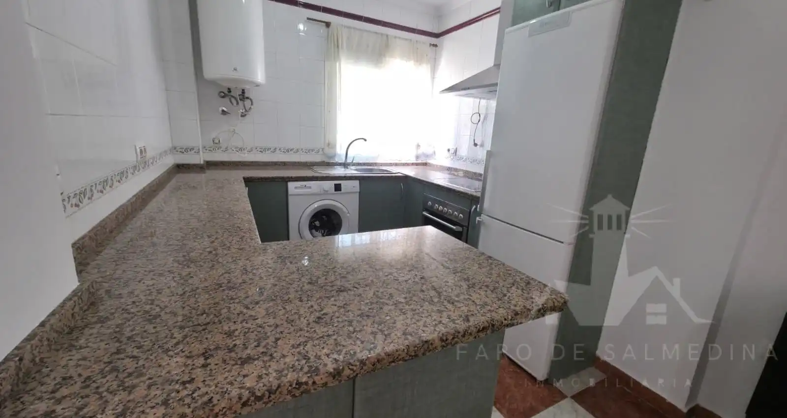 Küche von Einfamilien-Reihenhaus zum Verkauf in Chipiona mit Terrasse und Möbliert