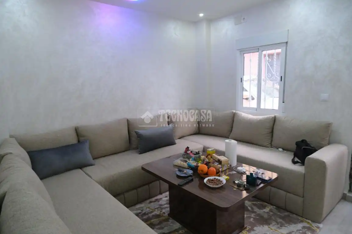 Sala de estar de Casa adosada en venta en Sevilla con Alarma