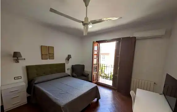 Habitación de Casa o chalet para compartir en Linares con Aire acondicionado, Terraza y Amueblado
