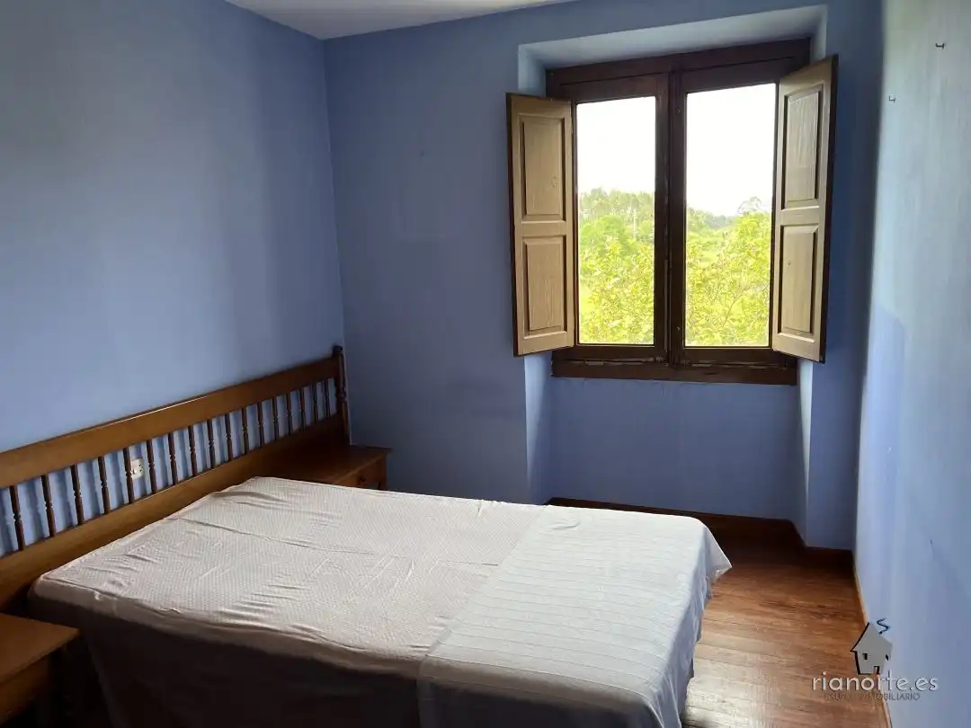 Dormitori de Casa adosada en venda en Ribadesella amb Jardí privat