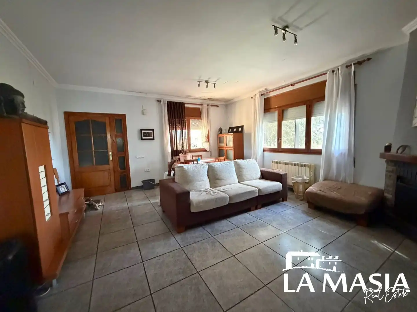 Sala d'estar de Casa o xalet en venda en Olivella amb Calefacció, Jardí privat i Terrassa