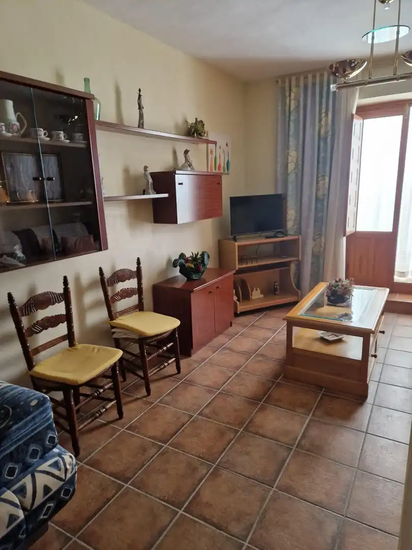 Sala d'estar de Casa adosada en venda en Jayena amb Traster, Moblat i Balcó