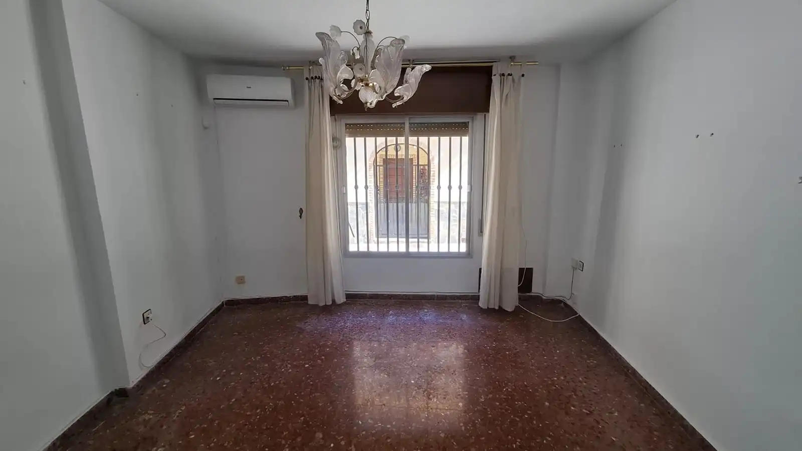 Sala d'estar de Casa adosada en venda en Motril amb Aire condicionat i Alarma