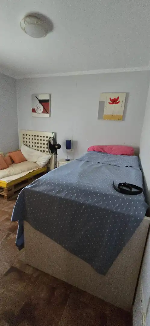 Habitación de Casa adosada en venta en El Portil con Calefacción, Trastero y Amueblado
