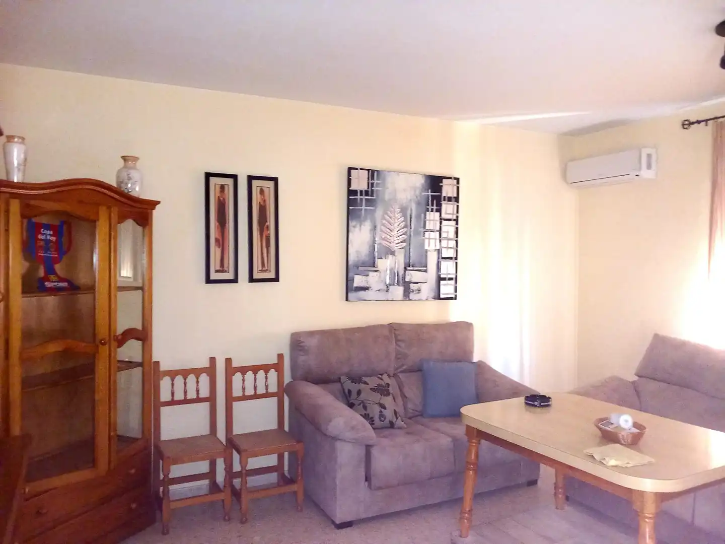 Sala d'estar de Casa adosada en venda en Talavera la Real amb Aire condicionat i Terrassa