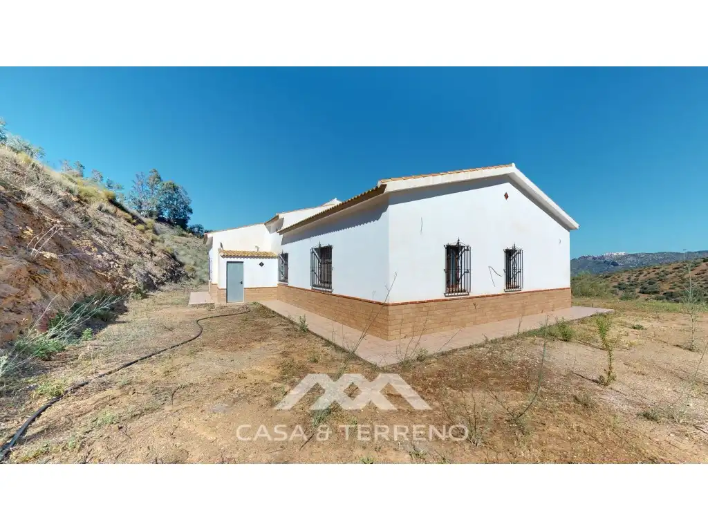 Vista exterior de Casa o xalet en venda en Colmenar amb Aire condicionat