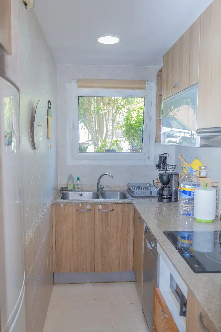 Küche von Wohnung zum Verkauf in Palafrugell mit Heizung, Abstellraum und Ofen